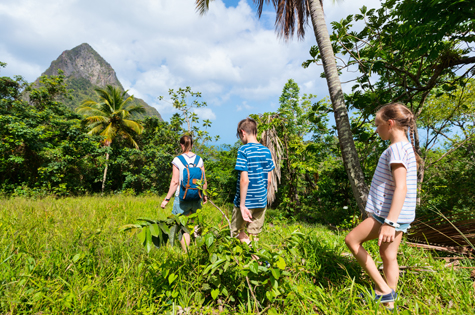 Saint Lucia family walking in rainforest